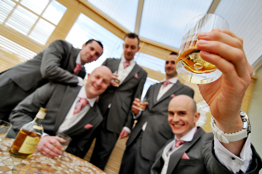 York Wedding Photographer capturing the boys enjoying a little drink to celebrate and steady the nerves.