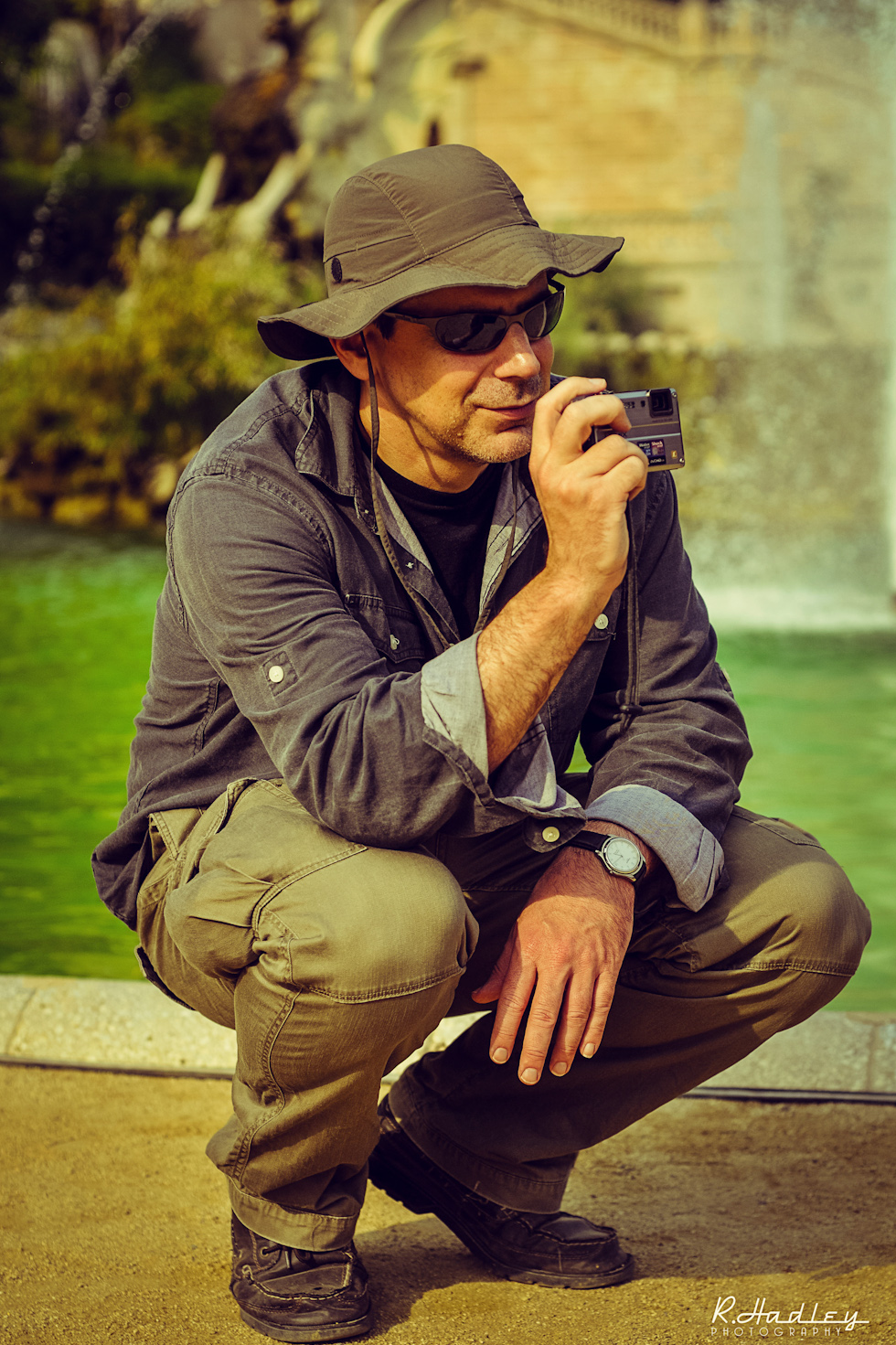 Photographer with waterproof camera in Parc de la Ciutadella, Barcelona